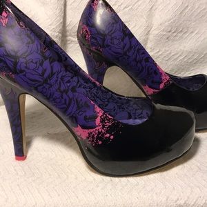Never worn! Iron fist black, purple & pink heels.